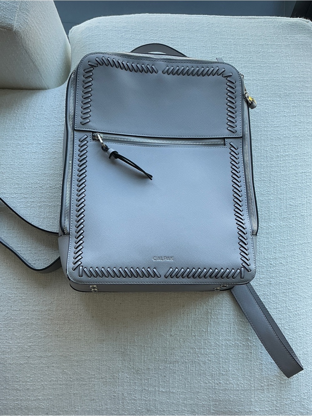 Calpak Light Gray Leather Backpack with Whipstitch Detailing